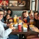 Adults enjoying kids meals for economical dining and perfect portion sizes