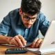 A 32-year-old person actively planning their aggressive 401k saving strategy to accelerate retirement growth.