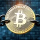 Bitcoin hard cap protection showing digital coin with immutable 21 million limit