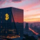 A modern financial building with Bitcoin elements, symbolizing the arrival of Bitcoin investment banks in El Salvador and its progressive financial future.