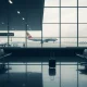 An empty airport terminal with a subtle airline logo, symbolizing the profound impact of a major budget airline closure on travel and the aviation industry.