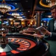 A person calmly observing a roulette wheel, symbolizing effective casino strategies and disciplined play.