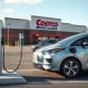An electric vehicle conveniently charging at a Costco EV charging station, highlighting the benefits for EV owners as tax credits decline.