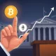 A visual representation of crypto sentiment shifting to greed, with Bitcoin and Ether price charts rising after a Fed announcement.