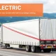 A modern semi-truck efficiently securing its load with an advanced electric tarp system, showcasing technological progress in trucking safety.
