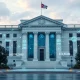 Federal Reserve governor announcing banking revolution with digital transformation and modern financial technology integration