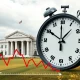 A visual representation of the potential panic caused by a jumbo Fed rate cut, showing economic indicators in decline.
