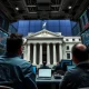 Federal Reserve rate cuts decision affecting Wall Street analysts and financial markets
