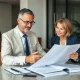 Financial adviser providing strategic wealth management consultation to investment executive