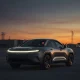 Fisker bankruptcy aftermath showing abandoned electric vehicles in industrial setting