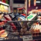Rising food inflation shown through expensive chocolate, butter and eggs in shopping basket