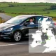 A Hertz electric vehicle confidently navigating a scenic route, powered by the Hertz EV Route Planner for a stress-free journey.