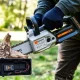 Modern cordless chainsaw demonstrating efficient wood cutting with advanced battery technology