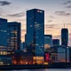 The iconic HSBC building standing tall in London's bustling Canary Wharf financial district, symbolizing the bank's renewed commitment to the area and its office strategy.