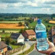 Residents receiving bottled water due to John Lewis water contamination from Leckford Estate's supply.
