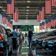 Consumer spending trends showing car purchases amid tariff concerns affecting retail economy