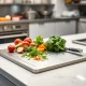 KatuChef Titanium Cutting Board in use for professional food preparation with fresh ingredients