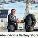 Two Indian energy company leaders shaking hands, symbolizing their alliance to advance Made-in-India Battery Storage technology for a greener future.