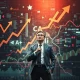 A strategist calmly analyzes complex charts, revealing a solution to the current Market Paradox amidst economic volatility.