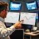 Analyst discussing Morgan Stanley's revised Fed interest rate cut projections on financial charts
