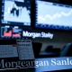 Morgan Stanley analysts review inflation forecast data on screens, indicating crucial economic revisions ahead of CPI release.