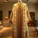 Traditional Moroccan caftan displayed as cultural heritage symbol with intricate embroidery