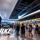 A vibrant Nike shoe display at a special event, highlighting the exciting Nike retailer partnership.