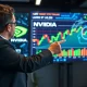 Financial analyst discussing Nvidia stock potential with AI technology backdrop