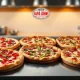 Papa Johns' new menu change featuring innovative, gourmet pizzas, strategically designed to attract new customers and boost market share.