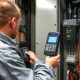 Engineer using PCE-PA 8000 power analyser for electrical system efficiency and safety measurements