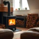 A modern wood burner radiating warmth, surrounded by neatly stacked premium heat logs, symbolizing efficient and sustainable home heating.