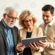 An image depicting diverse investors considering the implications of private assets in 401(k)s for their retirement planning.