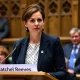 Rachel Reeves at a podium, correcting a parliamentary record, highlighting the scrutiny over her economic figures.
