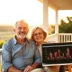 A happy couple enjoying their financially secure life, symbolizing the dream to retire at 61 with sufficient savings.