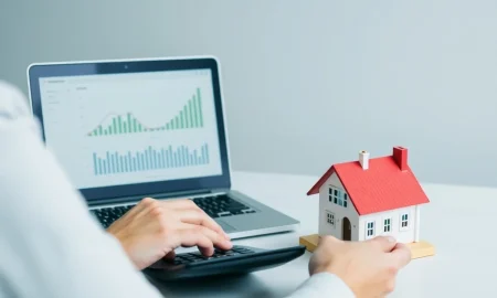A person contemplating financial options, including a Roth IRA withdrawal, for a home buyout decision.
