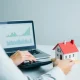 A person contemplating financial options, including a Roth IRA withdrawal, for a home buyout decision.