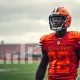 Shedeur Sanders, a promising Cleveland Browns rookie quarterback, stands on the field, symbolizing his burgeoning NFL career and Shedeur Sanders' net worth potential.