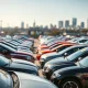 A dealership lot showcasing various vehicles, reflecting the current high used car prices in the market and the challenge of finding affordable options.