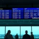 Frustrated passengers at a St. Louis airport terminal due to widespread Southwest Airlines cancellations.
