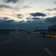 A Spirit Airlines plane parked at a quiet terminal, representing the airline's stark warning about its uncertain future.