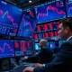Stock market decline showing downward trending charts and concerned investors analyzing Federal Reserve impacts
