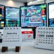 Stock market trading desk showing Labor Day 2025 closure with calendar and financial charts
