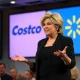Suze Orman retirement advice presentation featuring Costco and Walmart investment strategies