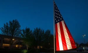 A vibrant tech flag display featuring smart lighting, a QR code, and subtle augmented reality effects, captivating viewers with modern innovation.