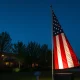 A vibrant tech flag display featuring smart lighting, a QR code, and subtle augmented reality effects, captivating viewers with modern innovation.