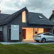 Tesla Powerwall and electric vehicle charging at a UK home, symbolizing Tesla electricity UK market entry and sustainable energy solutions.