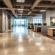A well-designed commercial space showcasing diverse, durable commercial flooring options, symbolizing smart business investments.