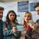Concerned consumers analyzing declining U.S. job market trends and economic data