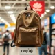 A person happily carrying a durable, bestselling Walmart backpack, symbolizing incredible value and smart shopping.