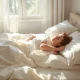 A person enjoying a restful sleep under soft, cool Walmart cooling sheets, emphasizing comfort and value.